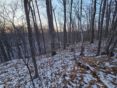 Escape to your own private retreat on this rolling, wooded 0 on Hardwoods Golf Club At Mille Lacs in Minnesota - for sale on GolfHomes.com, golf home, golf lot