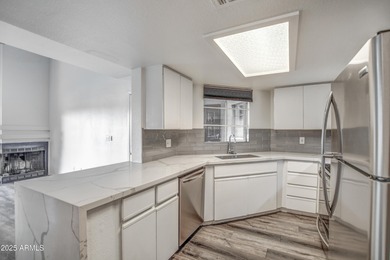 Enter to find living room w/vaulted ceilings flooded with on Stonecreek Golf Club in Arizona - for sale on GolfHomes.com, golf home, golf lot