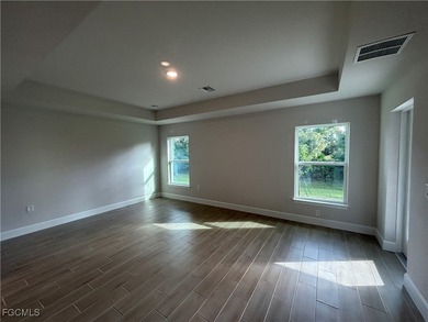 THIS BEAUTIFUL BRAND NEW ADAMS HOME IS MOVE IN READY AND WAITING on Kingsway Country Club in Florida - for sale on GolfHomes.com, golf home, golf lot