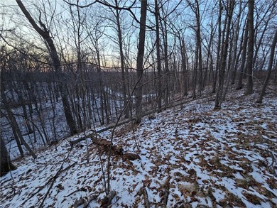 Escape to your own private retreat on this rolling, wooded 0 on Hardwoods Golf Club At Mille Lacs in Minnesota - for sale on GolfHomes.com, golf home, golf lot
