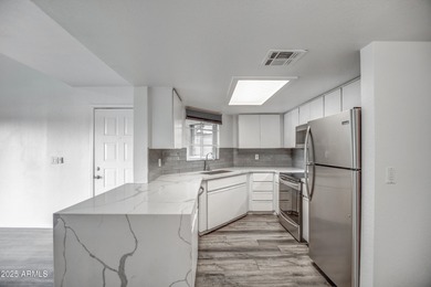 Enter to find living room w/vaulted ceilings flooded with on Stonecreek Golf Club in Arizona - for sale on GolfHomes.com, golf home, golf lot