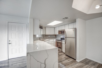 Enter to find living room w/vaulted ceilings flooded with on Stonecreek Golf Club in Arizona - for sale on GolfHomes.com, golf home, golf lot