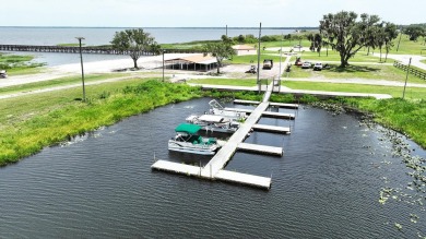 Come check out this rare opportunity to purchase a half-acre lot on Indian Lake Estates Golf and Country Club in Florida - for sale on GolfHomes.com, golf home, golf lot