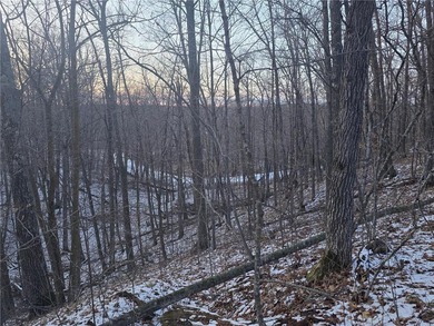 Escape to your own private retreat on this rolling, wooded 0 on Hardwoods Golf Club At Mille Lacs in Minnesota - for sale on GolfHomes.com, golf home, golf lot