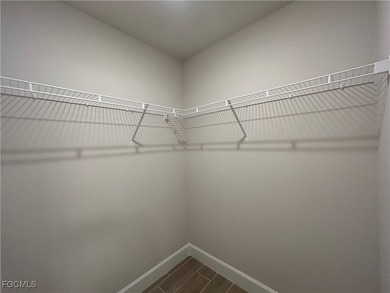 THIS BEAUTIFUL BRAND NEW ADAMS HOME IS MOVE IN READY AND WAITING on Kingsway Country Club in Florida - for sale on GolfHomes.com, golf home, golf lot