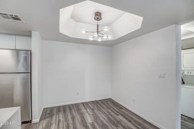 Enter to find living room w/vaulted ceilings flooded with on Stonecreek Golf Club in Arizona - for sale on GolfHomes.com, golf home, golf lot