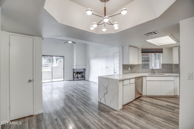 Enter to find living room w/vaulted ceilings flooded with on Stonecreek Golf Club in Arizona - for sale on GolfHomes.com, golf home, golf lot
