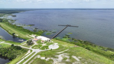 Come check out this rare opportunity to purchase a half-acre lot on Indian Lake Estates Golf and Country Club in Florida - for sale on GolfHomes.com, golf home, golf lot