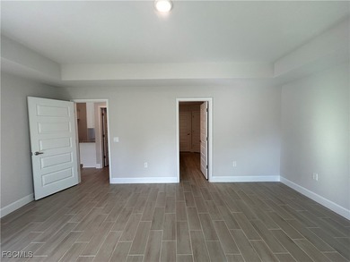 THIS BEAUTIFUL BRAND NEW ADAMS HOME IS MOVE IN READY AND WAITING on Kingsway Country Club in Florida - for sale on GolfHomes.com, golf home, golf lot