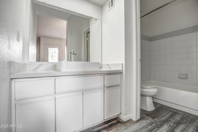 Enter to find living room w/vaulted ceilings flooded with on Stonecreek Golf Club in Arizona - for sale on GolfHomes.com, golf home, golf lot