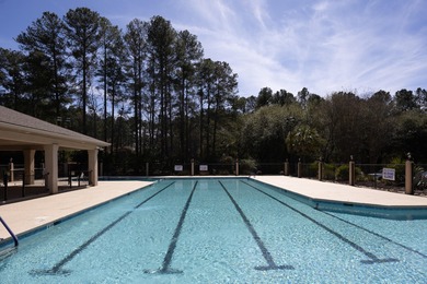 Timeless design, exceptional care, and serene outdoor living on The Golf Club At Cedar Creek in South Carolina - for sale on GolfHomes.com, golf home, golf lot