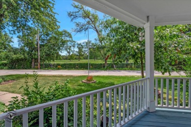 Situated on a tranquil street with picturesque views of the on Ravisloe Country Club in Illinois - for sale on GolfHomes.com, golf home, golf lot