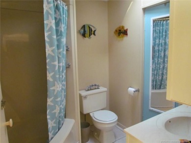 Come live the Florida lifestyle in this cozy, 1 bedroom, 1.5 on Island Dunes Country Club in Florida - for sale on GolfHomes.com, golf home, golf lot