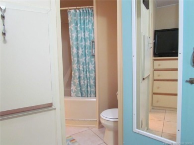 Come live the Florida lifestyle in this cozy, 1 bedroom, 1.5 on Island Dunes Country Club in Florida - for sale on GolfHomes.com, golf home, golf lot