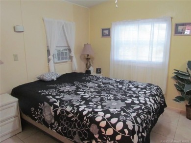 Come live the Florida lifestyle in this cozy, 1 bedroom, 1.5 on Island Dunes Country Club in Florida - for sale on GolfHomes.com, golf home, golf lot