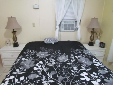 Come live the Florida lifestyle in this cozy, 1 bedroom, 1.5 on Island Dunes Country Club in Florida - for sale on GolfHomes.com, golf home, golf lot