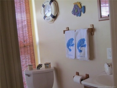 Come live the Florida lifestyle in this cozy, 1 bedroom, 1.5 on Island Dunes Country Club in Florida - for sale on GolfHomes.com, golf home, golf lot