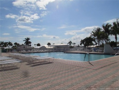 Come live the Florida lifestyle in this cozy, 1 bedroom, 1.5 on Island Dunes Country Club in Florida - for sale on GolfHomes.com, golf home, golf lot