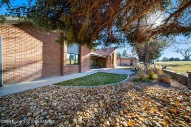 Nestled on fairway 7 of the San Juan Country Club, in Farmington on San Juan Country Club in New Mexico - for sale on GolfHomes.com, golf home, golf lot