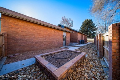 Nestled on fairway 7 of the San Juan Country Club, in Farmington on San Juan Country Club in New Mexico - for sale on GolfHomes.com, golf home, golf lot