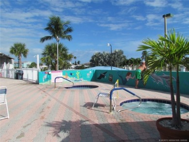 Come live the Florida lifestyle in this cozy, 1 bedroom, 1.5 on Island Dunes Country Club in Florida - for sale on GolfHomes.com, golf home, golf lot