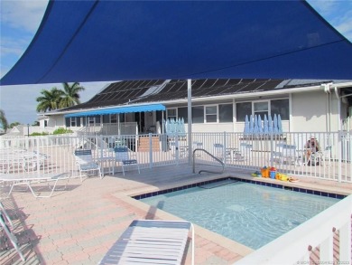 Come live the Florida lifestyle in this cozy, 1 bedroom, 1.5 on Island Dunes Country Club in Florida - for sale on GolfHomes.com, golf home, golf lot