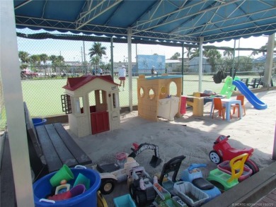 Come live the Florida lifestyle in this cozy, 1 bedroom, 1.5 on Island Dunes Country Club in Florida - for sale on GolfHomes.com, golf home, golf lot