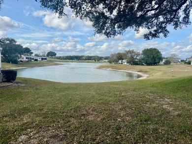 Home is located in Water Oak Country Club Estates in Lady Lake on Water Oak Country Club Estates in Florida - for sale on GolfHomes.com, golf home, golf lot