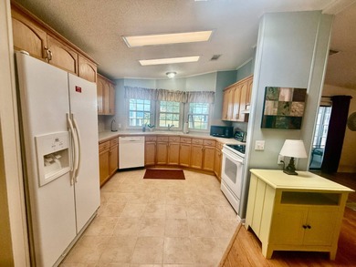 Home is located in Water Oak Country Club Estates in Lady Lake on Water Oak Country Club Estates in Florida - for sale on GolfHomes.com, golf home, golf lot