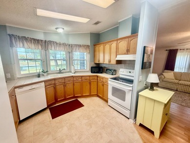 Home is located in Water Oak Country Club Estates in Lady Lake on Water Oak Country Club Estates in Florida - for sale on GolfHomes.com, golf home, golf lot