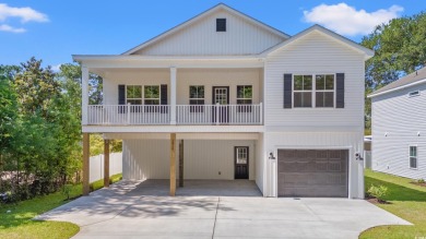 Welcome to your new beach house paradise! This new construction on Beachwood Golf Club in South Carolina - for sale on GolfHomes.com, golf home, golf lot