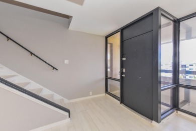 Location location!Beautiful remodeled  2 story penthouse with on Royal Palm Yacht and Country Club in Florida - for sale on GolfHomes.com, golf home, golf lot