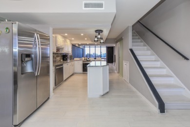 Location location!Beautiful remodeled  2 story penthouse with on Royal Palm Yacht and Country Club in Florida - for sale on GolfHomes.com, golf home, golf lot