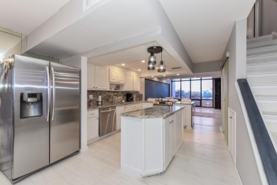 Location location!Beautiful remodeled  2 story penthouse with on Royal Palm Yacht and Country Club in Florida - for sale on GolfHomes.com, golf home, golf lot