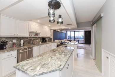 Location location!Beautiful remodeled  2 story penthouse with on Royal Palm Yacht and Country Club in Florida - for sale on GolfHomes.com, golf home, golf lot