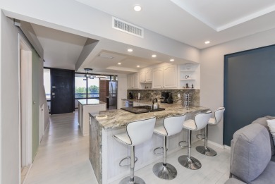 Location location!Beautiful remodeled  2 story penthouse with on Royal Palm Yacht and Country Club in Florida - for sale on GolfHomes.com, golf home, golf lot