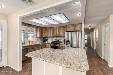 Enjoy resort living in this charming home located on a quiet on Fountain of the Sun Country Club in Arizona - for sale on GolfHomes.com, golf home, golf lot