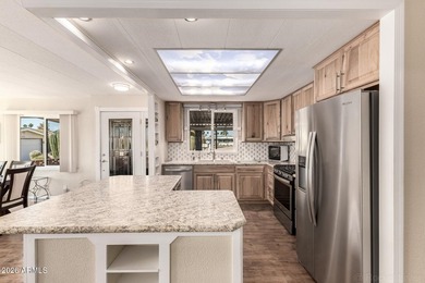 Enjoy resort living in this charming home located on a quiet on Fountain of the Sun Country Club in Arizona - for sale on GolfHomes.com, golf home, golf lot