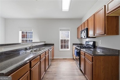 Welcome to 361 Eagle Tiff Dr, Sugar hill GA - where comfort on Sugar Hill Golf Club in Georgia - for sale on GolfHomes.com, golf home, golf lot