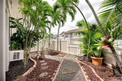 Behind the gates of The Arbors this ground floor townhome pairs on Ewa Villages Golf Course in Hawaii - for sale on GolfHomes.com, golf home, golf lot