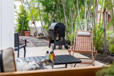 Behind the gates of The Arbors this ground floor townhome pairs on Ewa Villages Golf Course in Hawaii - for sale on GolfHomes.com, golf home, golf lot