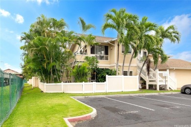 Behind the gates of The Arbors this ground floor townhome pairs on Ewa Villages Golf Course in Hawaii - for sale on GolfHomes.com, golf home, golf lot