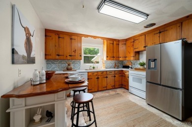 Nestled on a quiet street, this 3-bedroom, 1.5-bathroom  boasts on Twin Ponds Golf and Country Club in New York - for sale on GolfHomes.com, golf home, golf lot