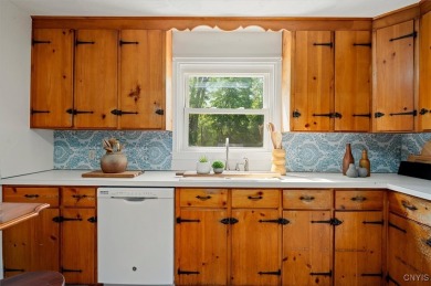 Nestled on a quiet street, this 3-bedroom, 1.5-bathroom  boasts on Twin Ponds Golf and Country Club in New York - for sale on GolfHomes.com, golf home, golf lot