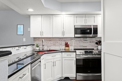 Fully furnished, ground-level luxury condo in the highly on Pointe Royale Village Country Club in Missouri - for sale on GolfHomes.com, golf home, golf lot