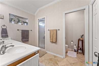 Lovely Cody POOL w/water features & Palm Trees for that tropical on Mill Creek Golf Club in Texas - for sale on GolfHomes.com, golf home, golf lot
