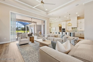 Step inside this stunning Egret V by ICI Homes, offering 4 on Amelia National Golf and Country Club in Florida - for sale on GolfHomes.com, golf home, golf lot