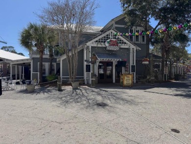 This amazing end unit condo with gorgeous views of the Grand on Sandestin Golf and Beach Resort - Raven in Florida - for sale on GolfHomes.com, golf home, golf lot