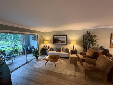 COMPLETELY UPDATED 2-BEDROOM 2 BATH EXQUISITELY DONE, FEATURES on Wynmoor Golf Course in Florida - for sale on GolfHomes.com, golf home, golf lot