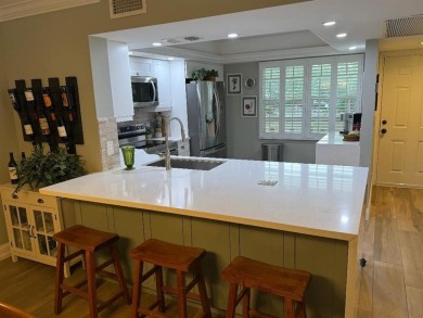 COMPLETELY UPDATED 2-BEDROOM 2 BATH EXQUISITELY DONE, FEATURES on Wynmoor Golf Course in Florida - for sale on GolfHomes.com, golf home, golf lot